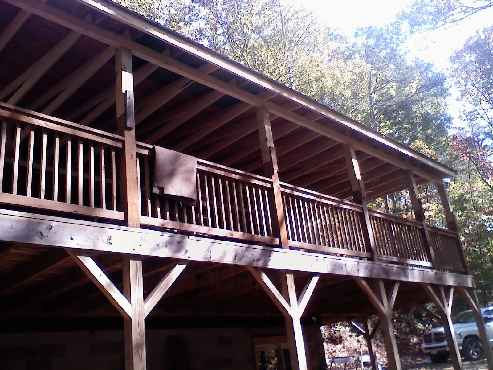 Timber framing under a new elevated porch and deck — Roof Leak Repair in New Freeport by Roofing Brothers